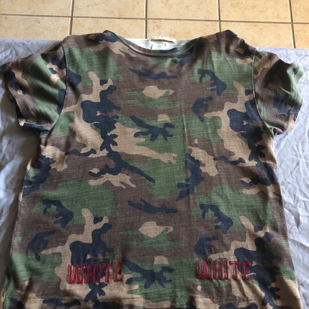 Large off white tee with retro tags